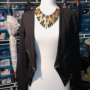 Black blazer with gold zippers